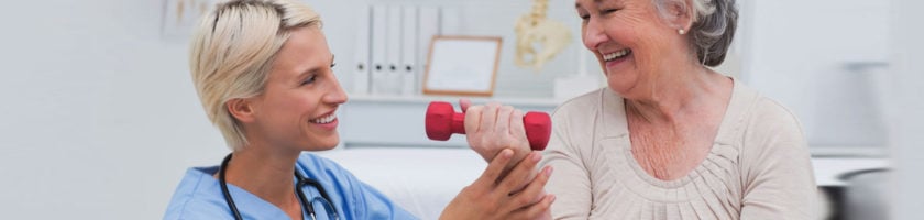 health care worker helping senior