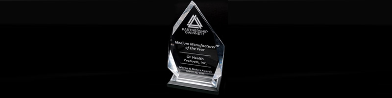 10th Annual Movers and Makers award trophy
