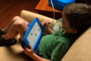 Child using John Bunn Neb-u-Tyke Neb-a-Doodle